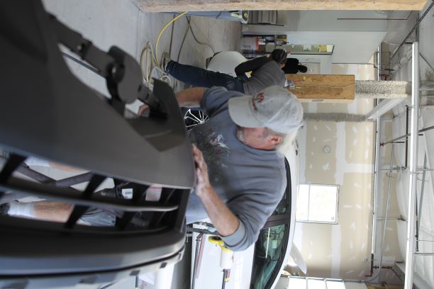 Vehicle on lift during repair