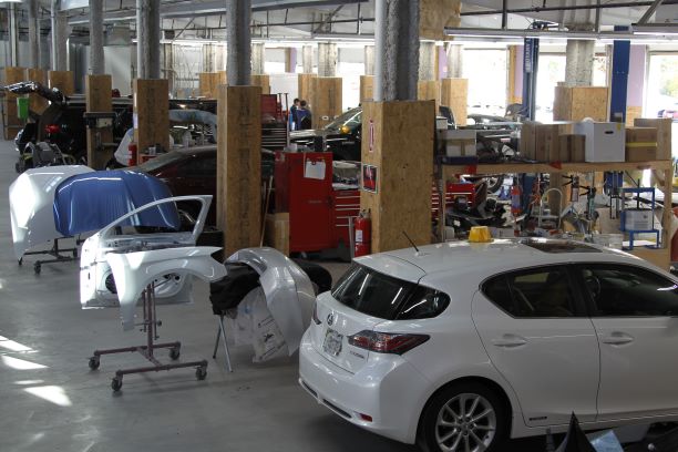 Shop floor with lifts and lighting